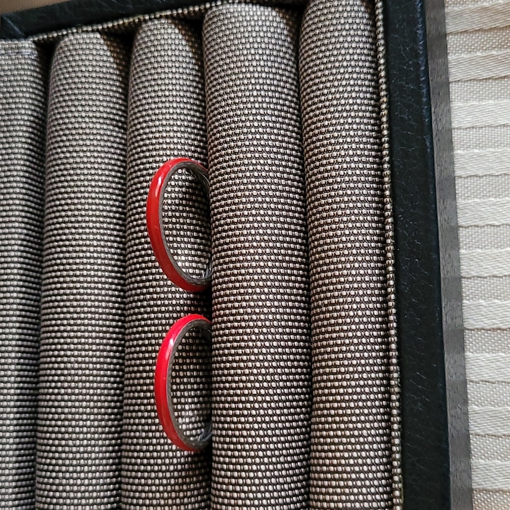Two red enamel bands.
